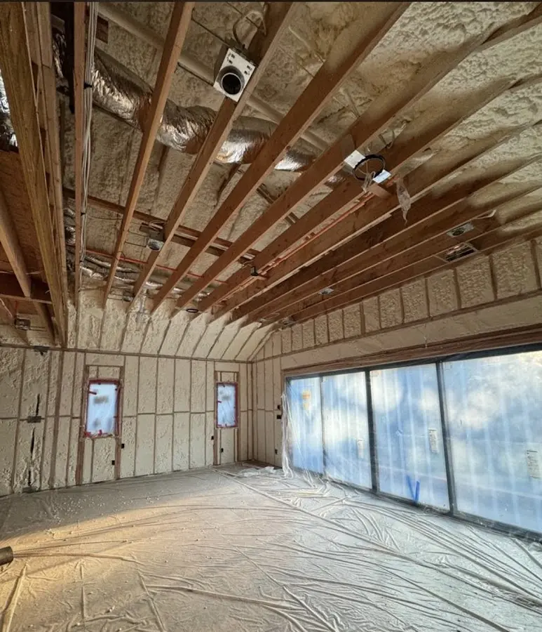 Interior walls and ceiling insulated with spray foam during new construction in Batesville